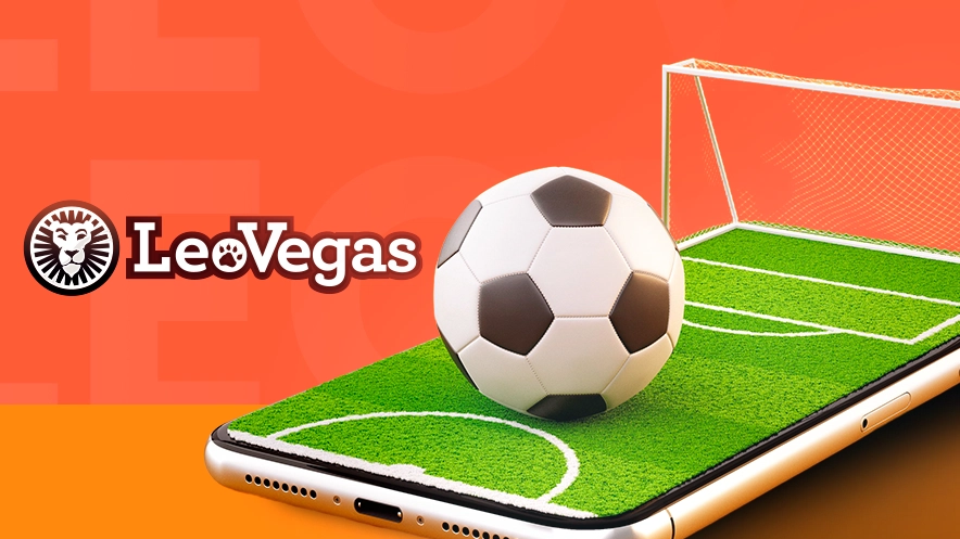 Imagem mostra smartphone como campo de futebol e uma bola ao lado da logomarca da LeoVegas