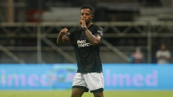 O volante Tchê Tchê comemora gol com a camisa do Botafogo (foto: Vitor Silva/Botafogo)
