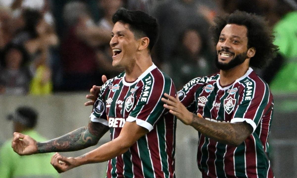 Cano e Marcelo comemoram gol do Fluminense, na Libertadores (foto: MAURO PIMENTEL / AFP)