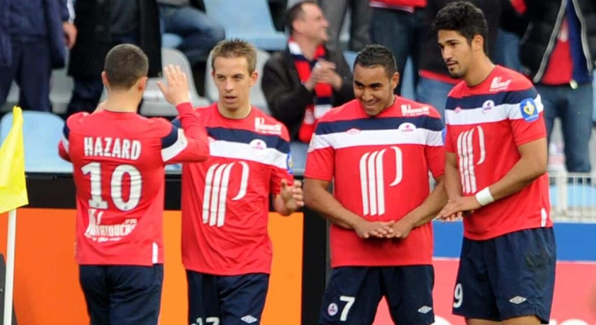 Payet e Tulio de Melo (foto: AFP PHOTO DENIS CHARLET)