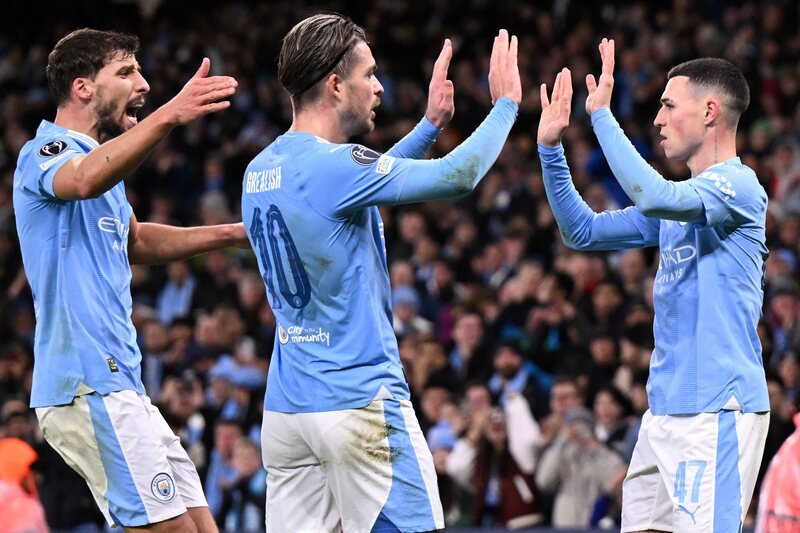Jogadores do City comemorando (foto: Oli Scarff/ AFP via Getty Images)