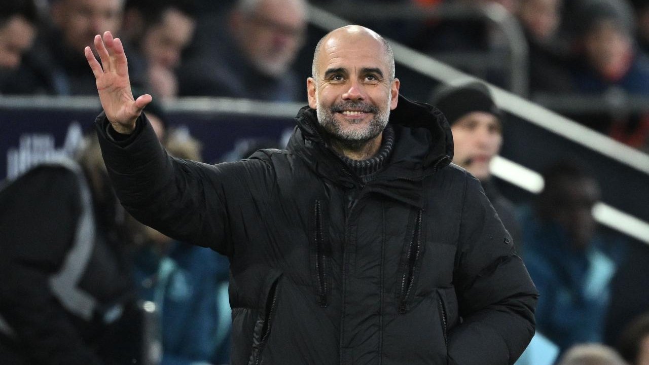 Pep Guardiola, técnico do Manchester City, é o favorito para vencer o prêmio (foto: JUSTIN TALLIS/AFP)