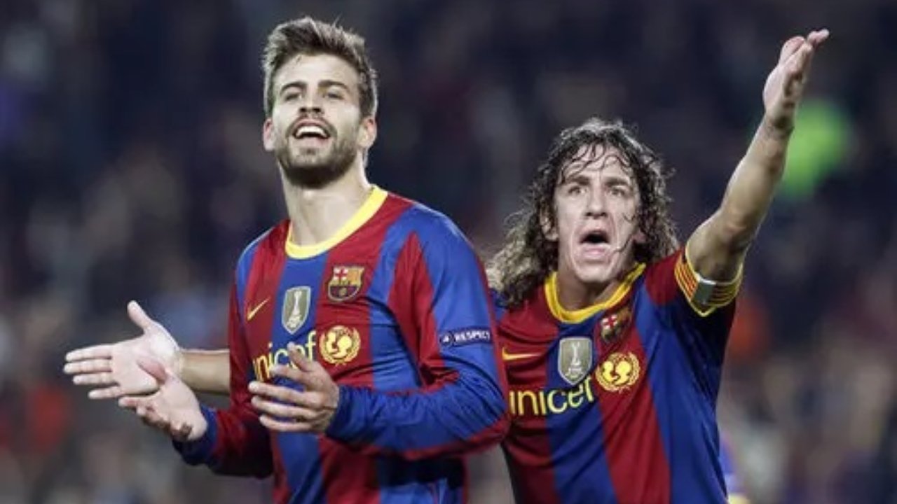 Piqué e Puyol (foto: Reprodução Facebook do Barcelona)