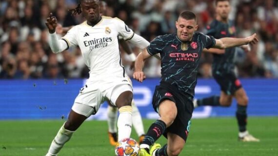 Lance do jogo entre Real Madrid e Manchester City (foto: Pierre-Philippe Marcou/AFP )