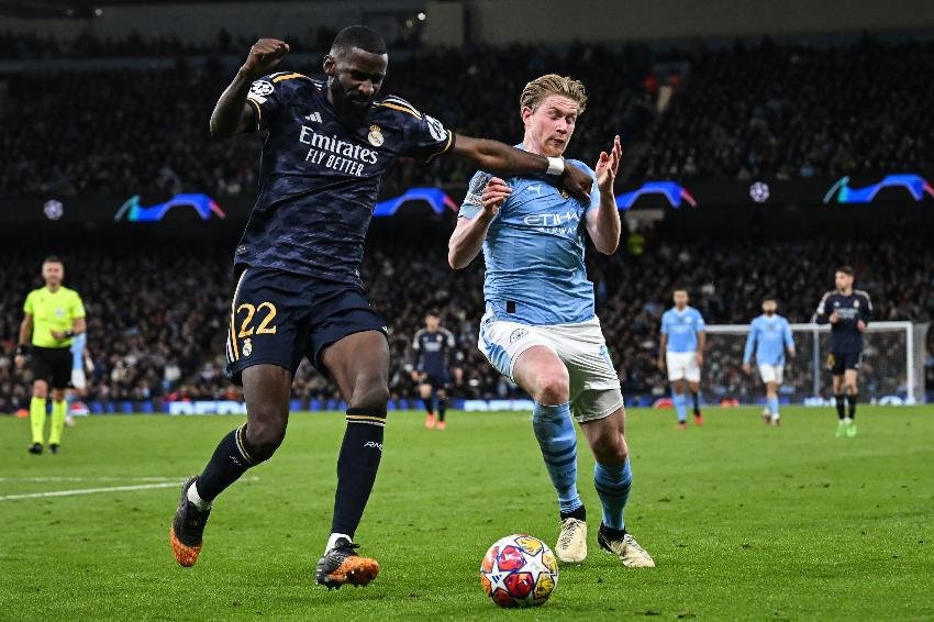 Real Madrid e Manchester City na Champions League (foto: Paul ELLIS / AFP)