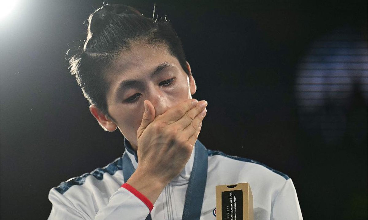 Taiwanesa Lin Yu-ting ganhou a medalha de ouro na categoria feminina até 57 kg no boxe (foto: Mauro PIMENTEL/AFP)