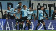 Jogadores do Racing comemorando (foto: ALEJANDRO PAGNI / AFP)