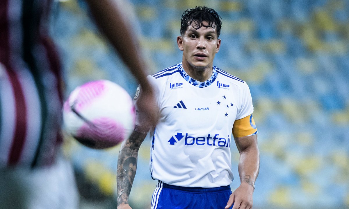 Lucas Romero em jogo pelo Cruzeiro (foto: Gustavo Aleixo/Cruzeiro)