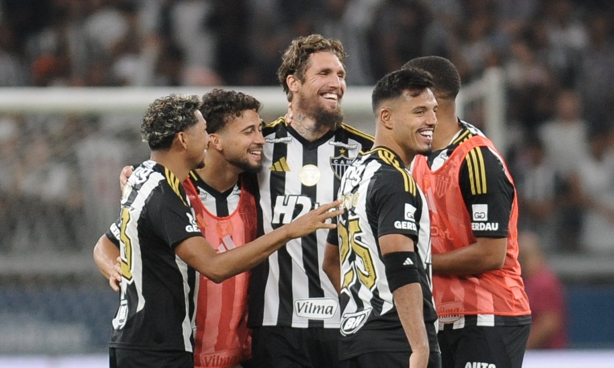 Jogadores do Atlético comemoram goleada sobre o América (foto: Alexandre Guzanshe/EM/D.A Press.)