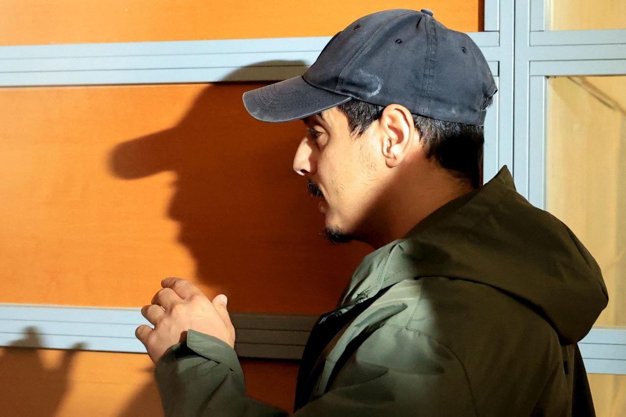 Ben Yedder de boné (foto: Valery Hache / AFP)