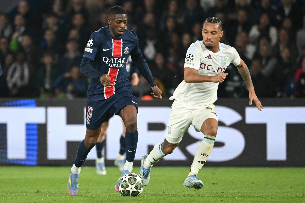 Dembele e Kamara disputando bola (foto: Bertrand Guay / AFP)