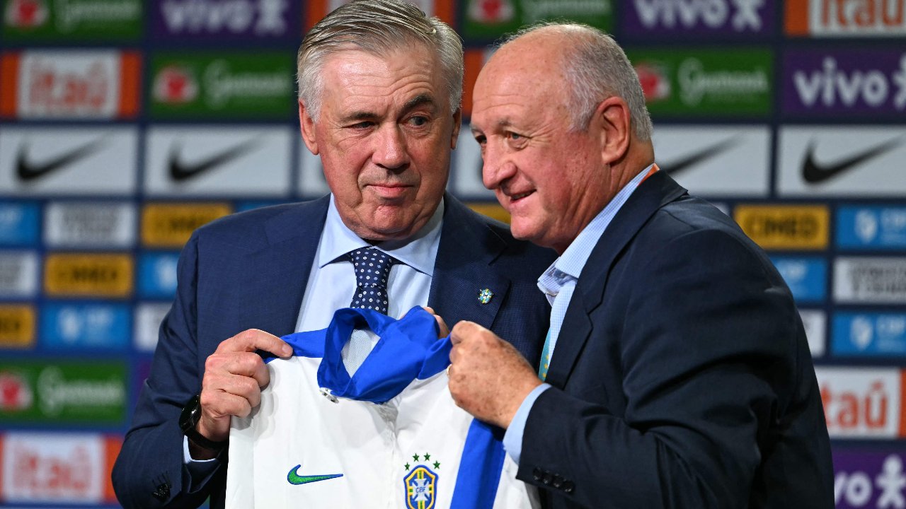 Ancelotti e Felipão na apresentação do italiano (foto: Mauro PIMENTEL / AFP)