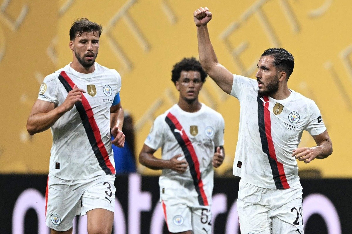 Jogadores do Manchester City comemoram gol no Mundial de Clubes (foto: PATRICIA DE MELO MOREIRA / AFP)