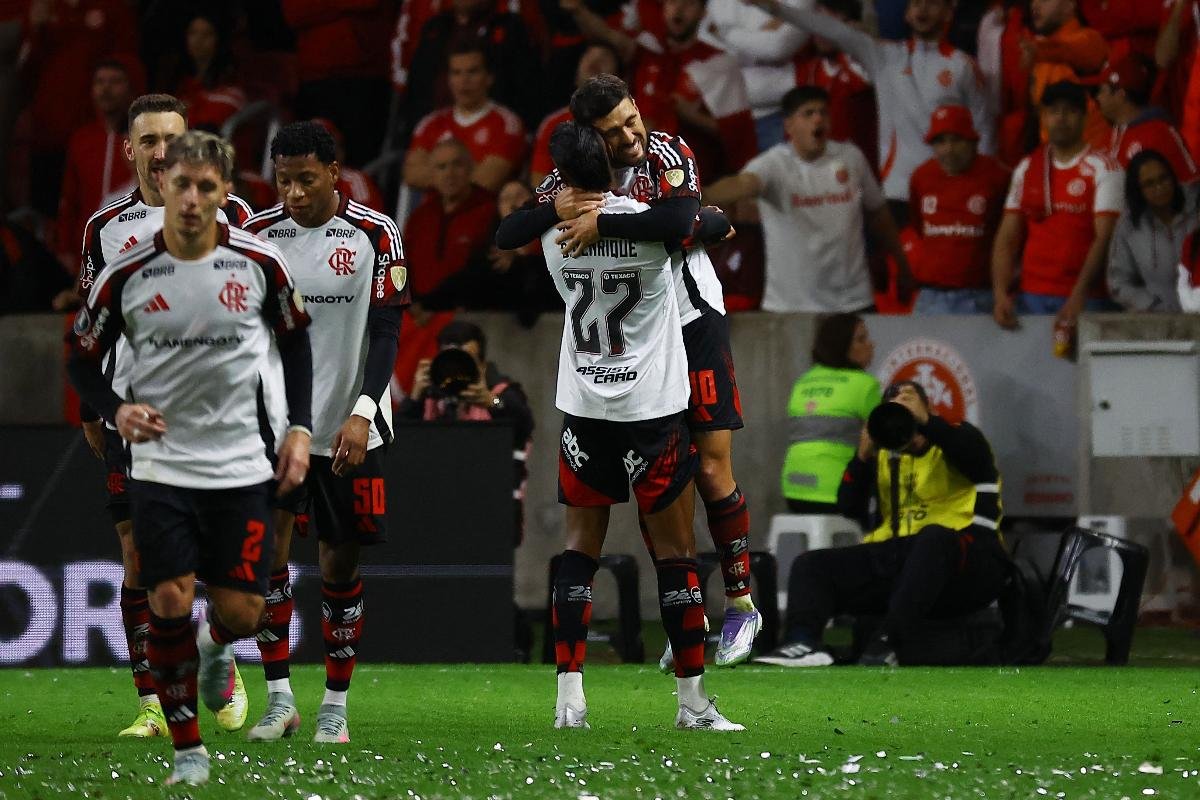 Arrascaeta comemora gol contra o Flamengo na Libertadores (foto: SILVIO AVILA/AFP)