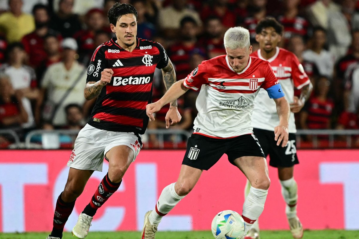Lance do jogo entre Flamengo e Estudiantes pela Copa Libertadores (foto: Pablo PORCIUNCULA/ AFP)