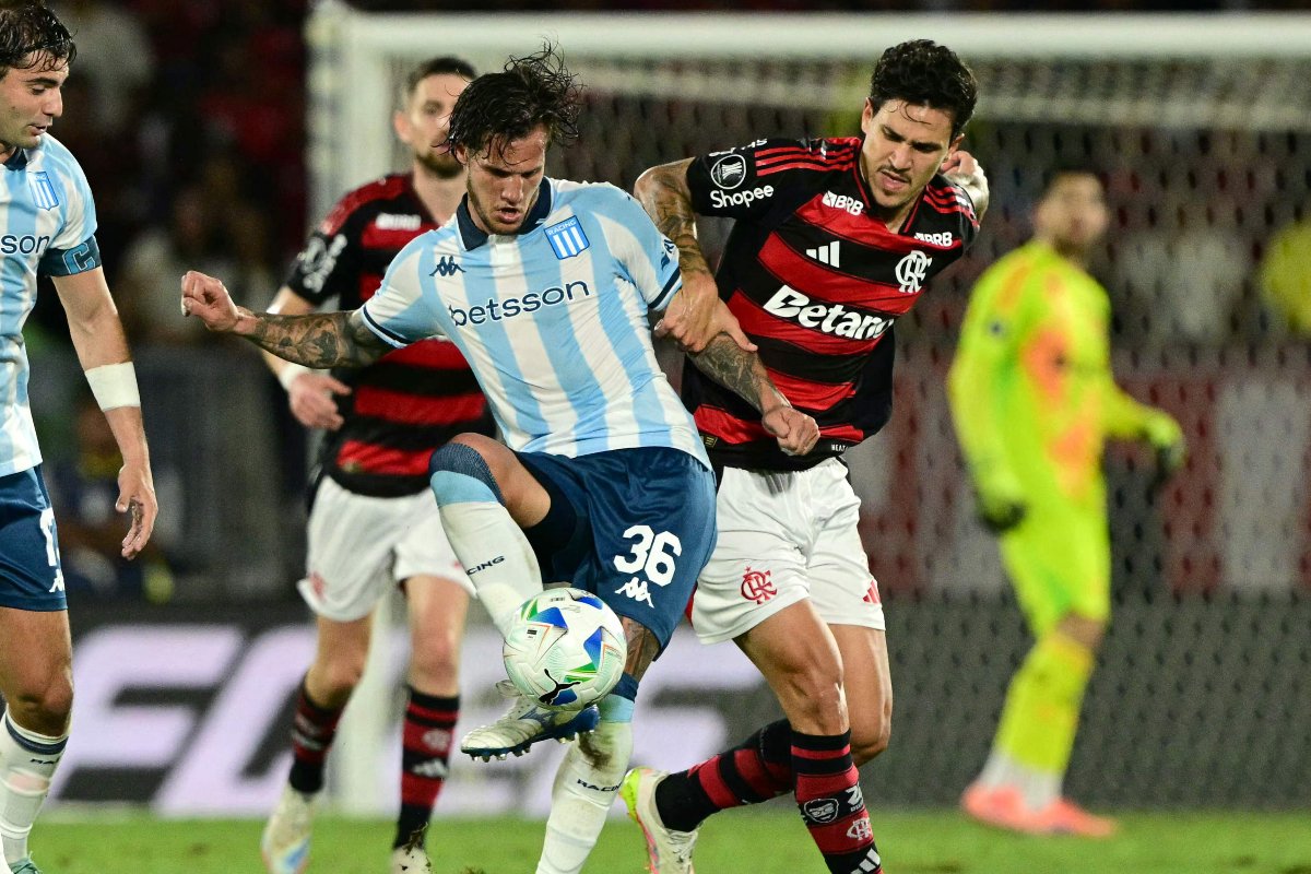 Lance do jogo entre Flamengo e Racing pela Libertadores (foto: PABLO PORCIUNCULA/ AFP)