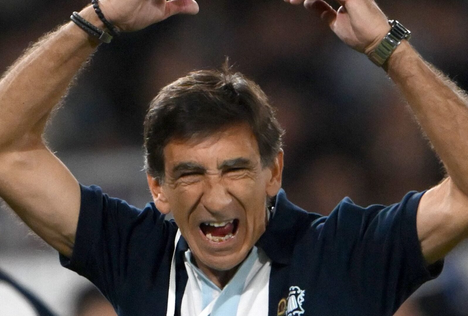 Técnico Gustavo Costas, do Racing, comemora (foto: Luis Robayo/AFP)