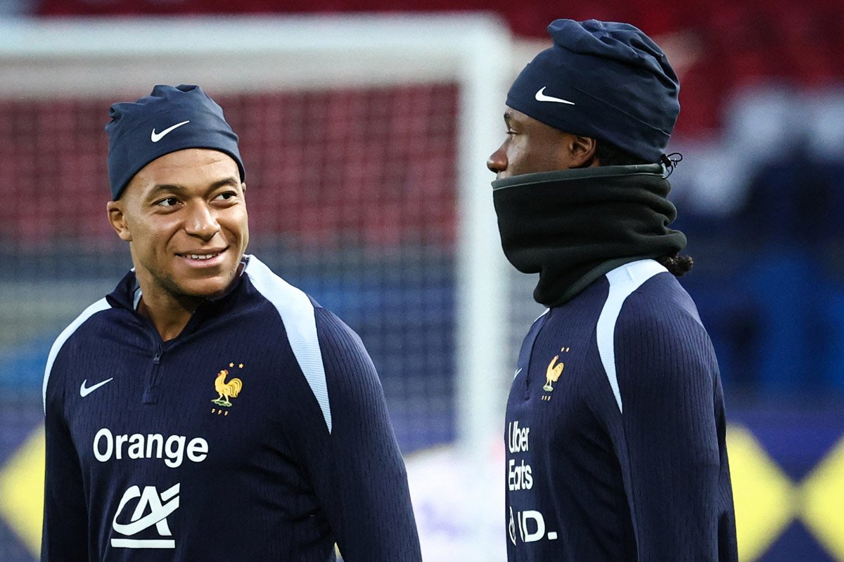 Mbappé e Camavinga são companheiros no Real Madrid e na Seleção Francesa (foto: FRANCK FIFE / AFP)