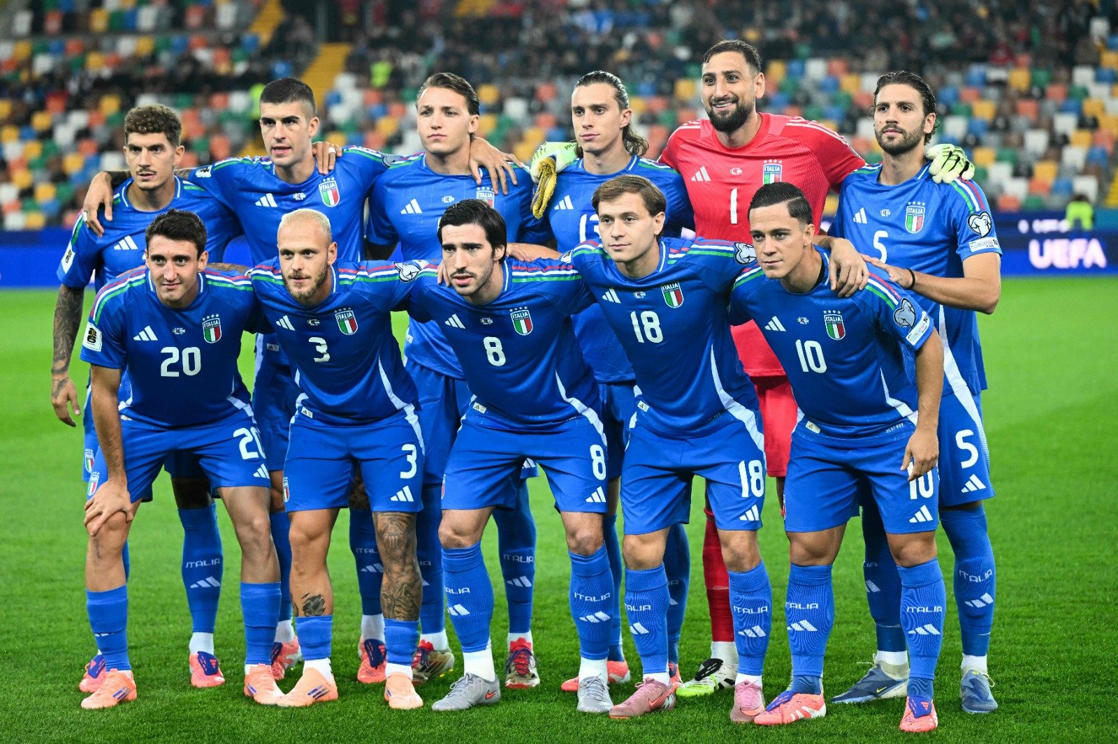 Jogadores da Seleção Italiana posados (foto: Stefano Rellandini/AFP)